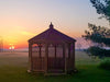 Wooden Gazebo-In-A-Box on a sunset
