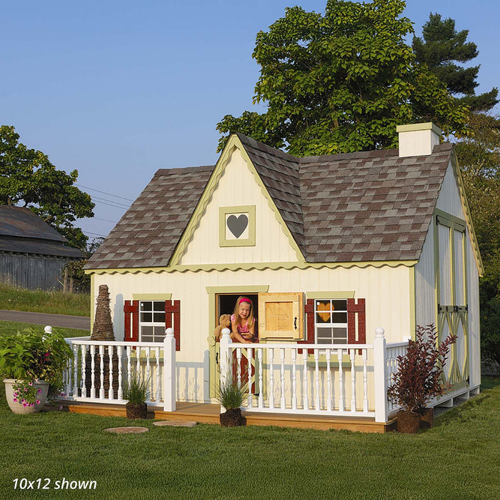 10x12 Victorian Playhouse by Little Cottage Co. in yellow with red shutters, featuring a girl with a teddy bear leaning on the porch railing.
