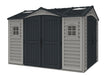 Duramax Apex Pro 10.5x 8 outdoor storage shed with two sets of dark gray double doors, multiple windows, and a dark gray roof featuring skylights.