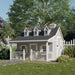 Gray Little Cottage Co. 11x10 Pennfield Cottage Playhouse featuring three dormer windows, white trim, Dutch door, and front porch set in a lush fenced yard.