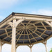 Underneath view showing the intricate wooden structure and aluminum roof of the Meridian 12’ Octagon Gazebo.