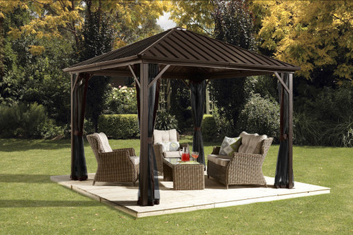 12x12 Sojag Dakota gazebo with brown wicker furniture set in outdoor setting