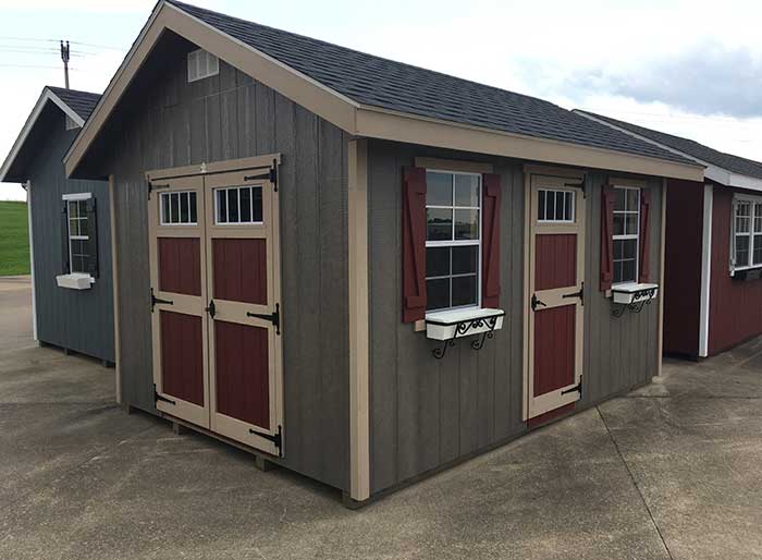 12x14 riverside garden shed with transom windows and flower boxes painted in red