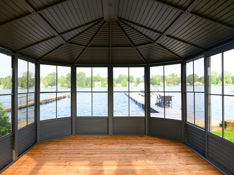 Interior view through the mesh screen of Florence Solarium Gazebo showing the lake outside