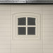 Close-up of the window on the side of the Lifetime 8 Ft. x 15 Ft. Outdoor Storage Shed showing the detail of the frame and pane.
