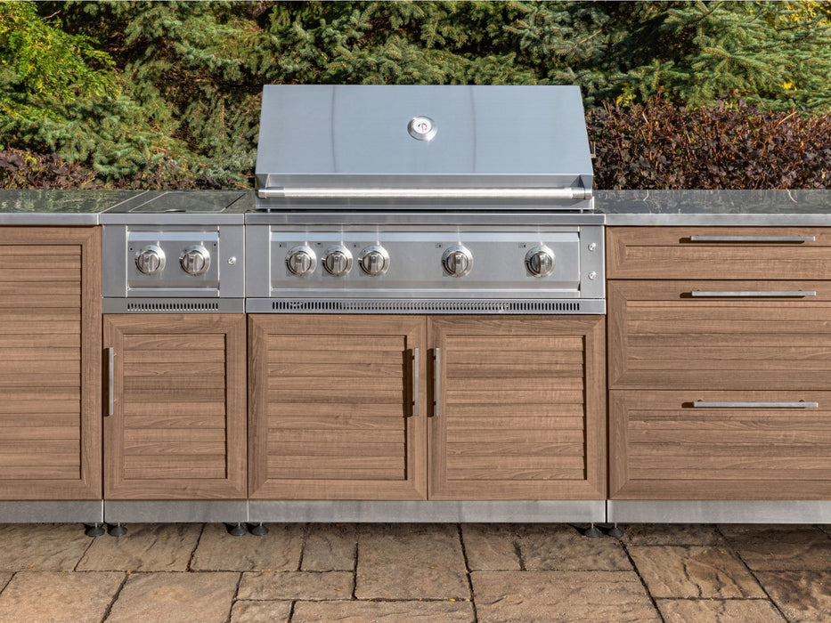 a close up of Outdoor Kitchen	Grove Style	Cabinet Set	with stainless steel grill in the backyard
