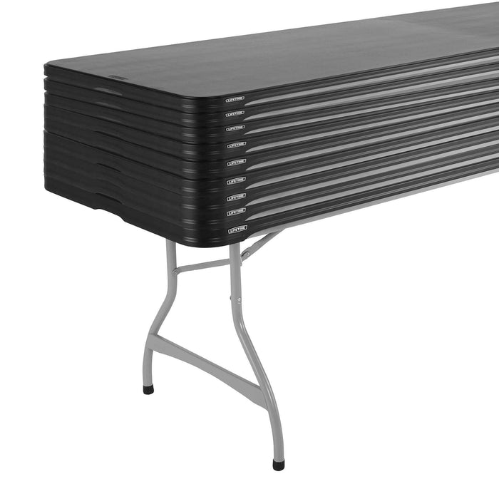 Close up of stacked Lifetime 8-Foot folding tables with steel frame legs