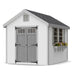 8x10 white Colonial Williamsburg shed by Little Cottage Co. featuring vented gable, transom doors, and decorative flower box under gray roof.