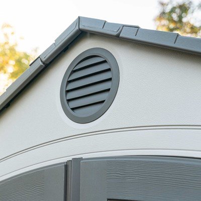 Close-up of the Lifetime storage shed's gable vent and roof peak detail.