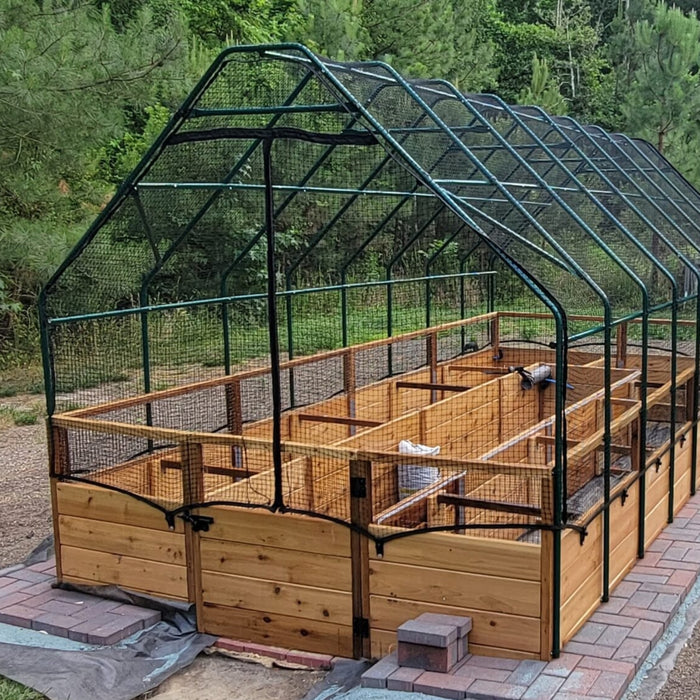 Outdoor Living Today 8x16 Garden in a Box with Birdnetting Cover newly installed, green frame and mesh over empty cedar beds on brick pavers
