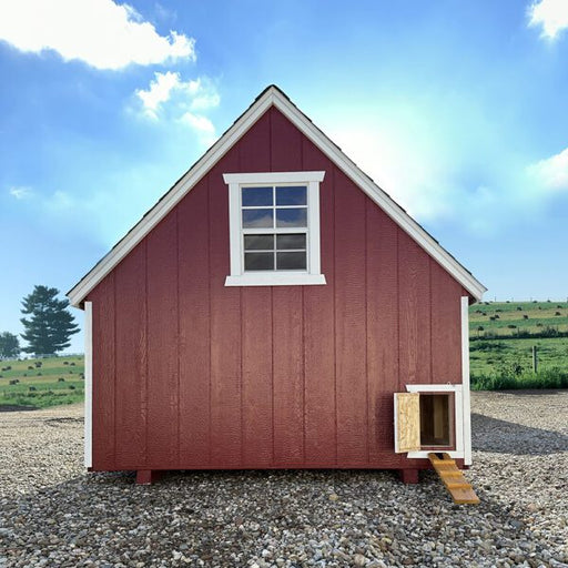 A-frame with open chicken door and ramp on the red coop.