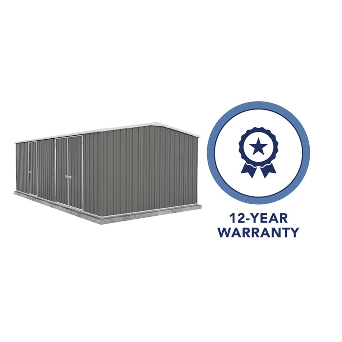 Absco Workshop Metal shed with 12-year warranty badge.