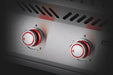 Close-up view of the control knob on the burner with red illumination