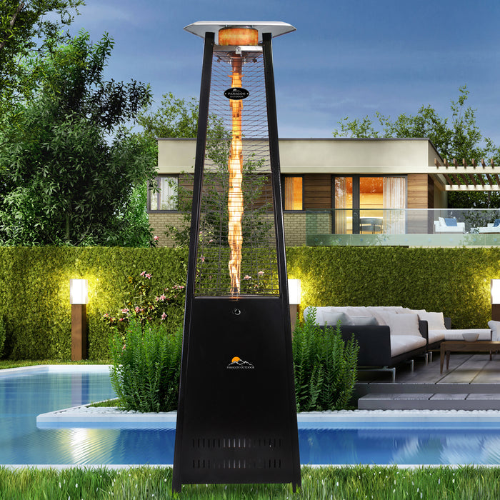 Black Paragon Outdoor Vesta Flame Tower Heater by a poolside