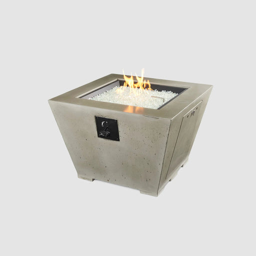 Outdoor Greatroom Co Cove Square gas fire pit bowl with lit flame, close-up view.
