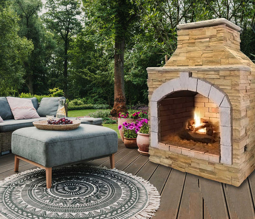 48-Inch Outdoor fireplace in backyard with sofa