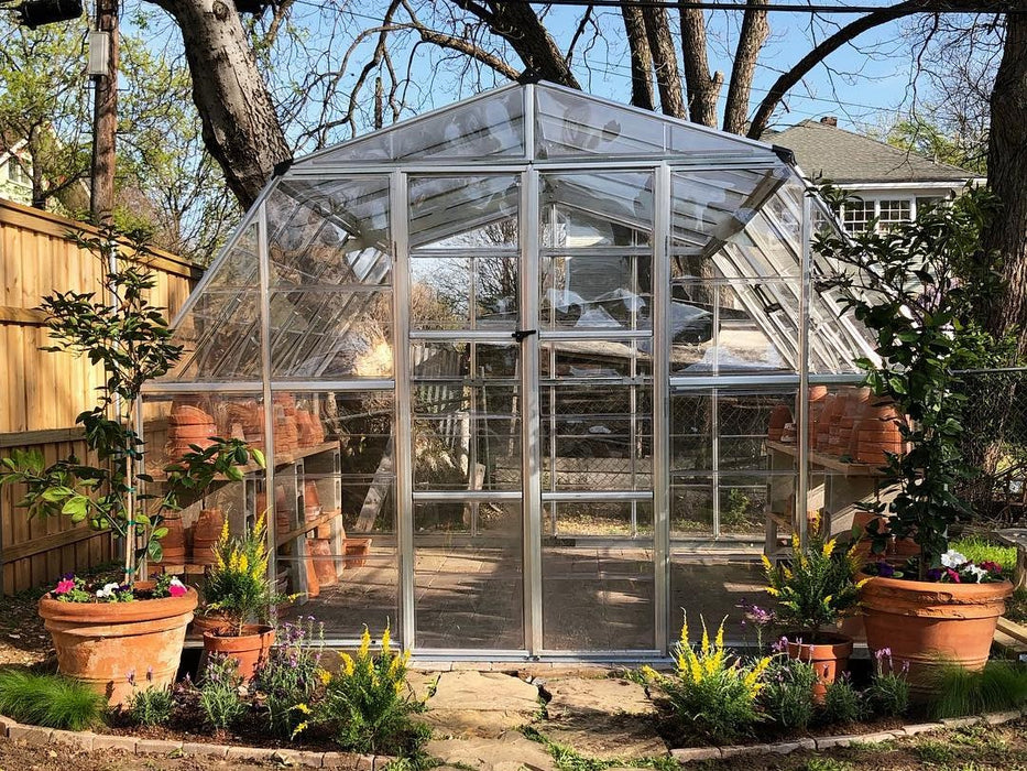 Canopia Americana 12' x 12' Greenhouse placed outdoors empty inside