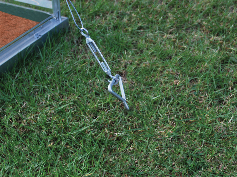 Canopia Anchor Kit for Snap and Grow Greenhouses anchored in green grass