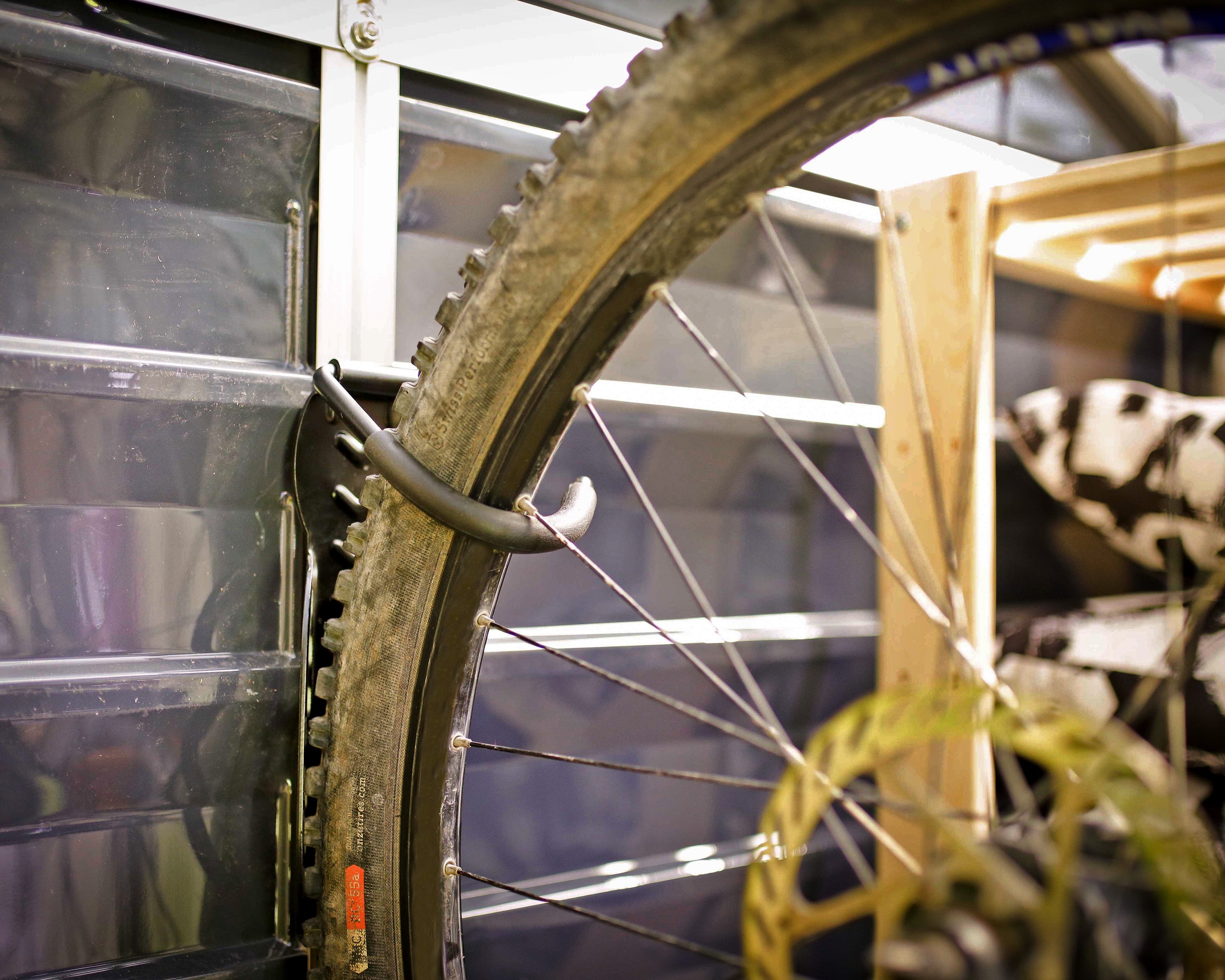 Maximize Space with Canopia Shed Bike Hook Vertical Storage Solution