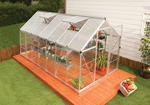 Overhead shot of the Canopia Hybrid 6' x 14' Greenhouse in Silver placed in the backyard.