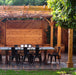 12×16 Cedar Pergola Kit with dining table and chairs