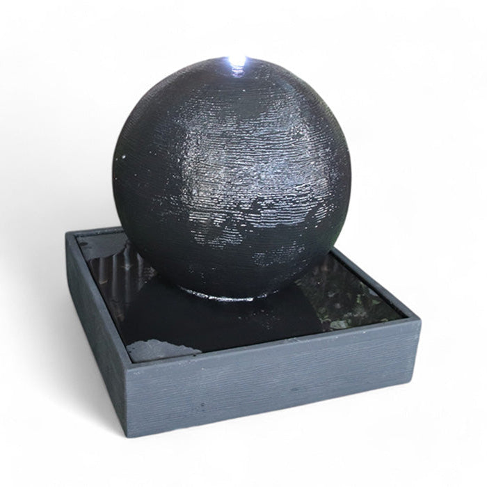 Black sphere water fountain with LED light at top, Exaco Luna Ball design, modern indoor tabletop fountain