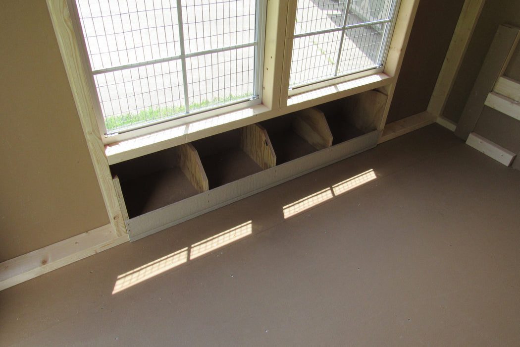 Interior of a 5x8 EZ-Fit chicken coop showing spacious nesting boxes and the clean, uncluttered layout.