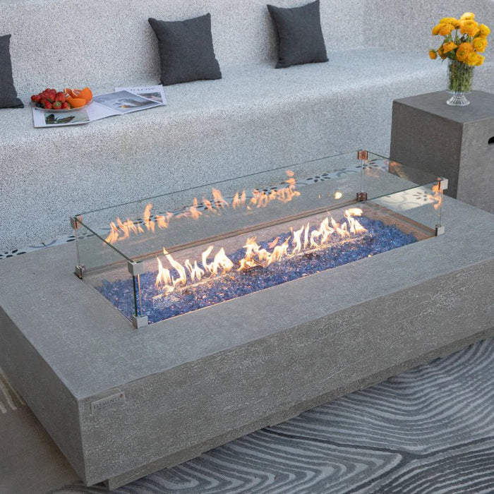 Riviera Rectangular Fire Table with glass stones on fire