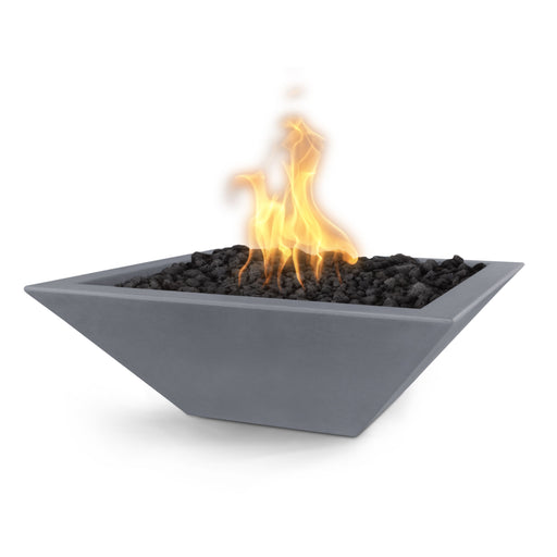 Modern square GFRC concrete fire bowl in gray finish, with bright flames at the center.