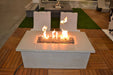 Sleek Solus Firetable centerpiece in a contemporary lounge setup, perfect for social gatherings or tranquil solitude.