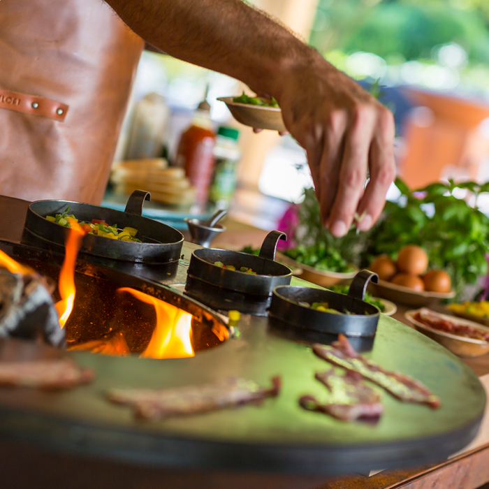 OFYR Classic Corten 85 with a man cooking