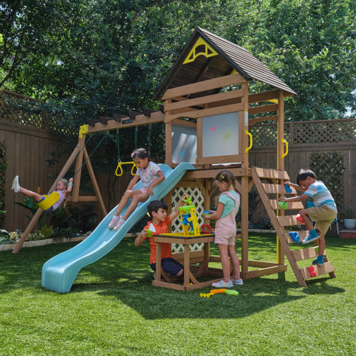 Kids playing around the wooden playhouse