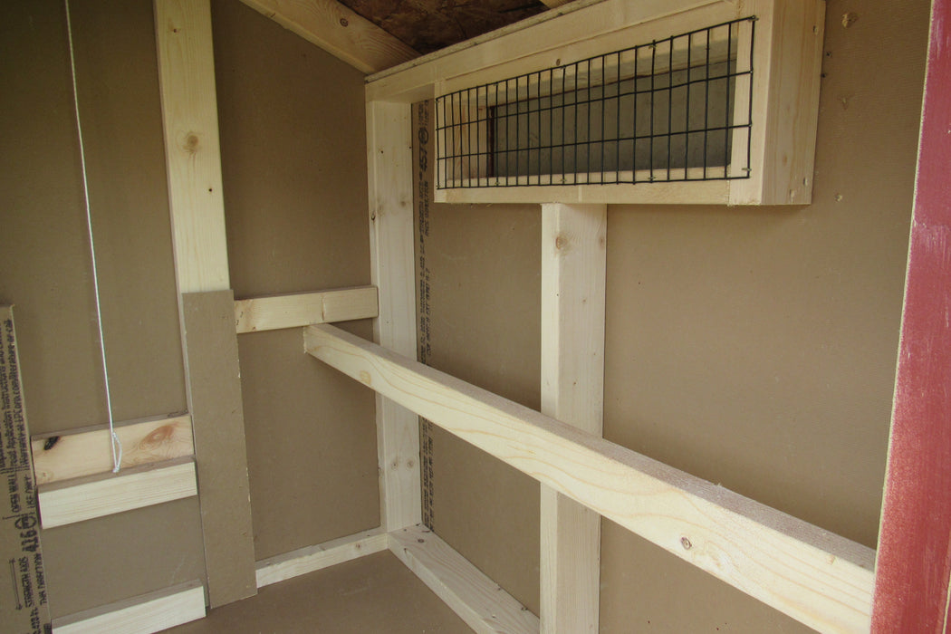 Interior view of EZ-Fit chicken hutch highlighting the perches and screened window.