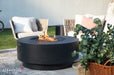 Nimes Round Fire Pit with chairs