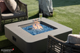 Elementi Plus Lucerne Concrete Fire Pit Table with chairs and drink