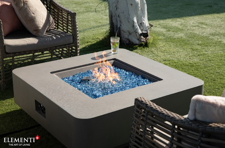 Elementi Plus Lucerne Concrete Fire Pit Table with chairs and drink
