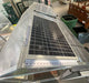 Close up of Exaco's solar panel installed on the roof of a greenhouse