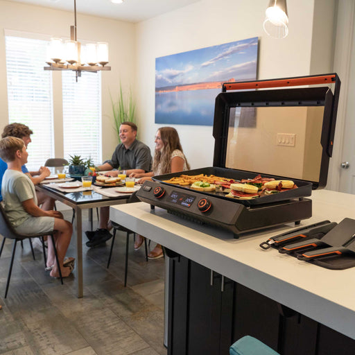 A family using the electric griddle