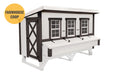 A chic OverEZ XL Chicken Coop with a farmhouse white design, featuring a spacious interior and classic window detailing, made to house up to 20 chickens.