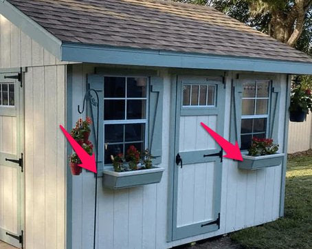 An Ez-Fit Garden Shed with two Flower Box Holders.
