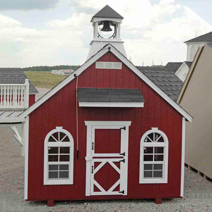 Front view of the delightful Little Cottage Company Stratford Schoolhouse Playhouse, perfect for imaginative play.