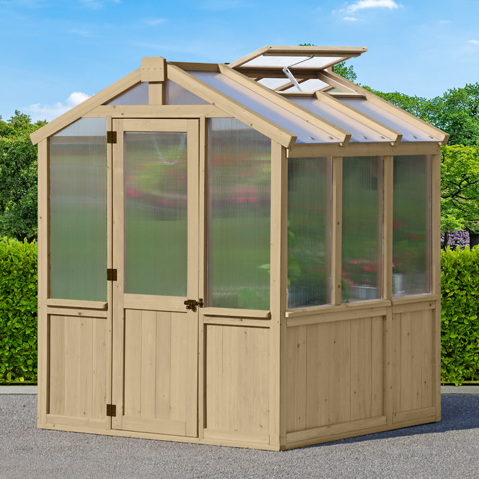 A full view of the Meridian Cedar 6.7ft x6 Yardistry Greenhouse in a garden setting.