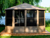 Full view of the Gazebo Penguin Florence Freestanding Solarium with sand metal roof, displaying the entire structure set beside a lake