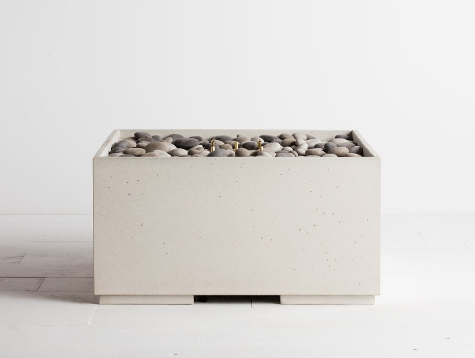 Warm Halva beige toned Solus Decor Firebox 30 with a contemporary boxy look and a grey pebble filling, perfect for chic outdoor heating.