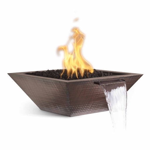Square Maya fire bowl in hammered copper with water spill feature and glowing flames, ideal for contemporary outdoor decor.