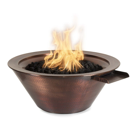Round Cazo Hammered Copper Fire & Water Bowl by The Outdoor Plus, with flames elegantly rising from the center, in white background