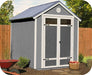 Front view of the Handy Home Gable wood shed in a backyard setting