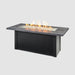 Main product image of the Carbon grey and black base Fire Pit Table with flames, showcasing the overall design and ambiance.