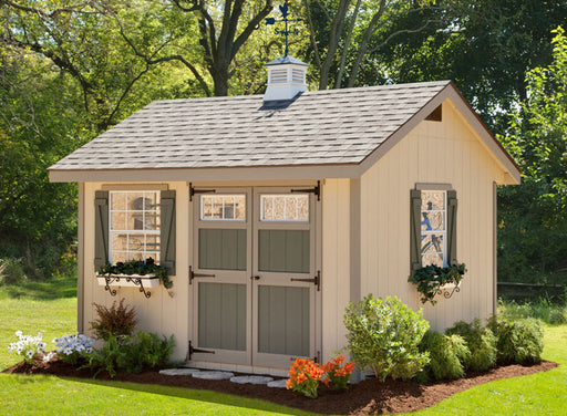 Beige Ez Fit sheds Heritage garden shed with flower box and double doors, set against a green landscape.