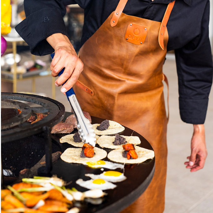 OFYR Island Corten with a man grilling